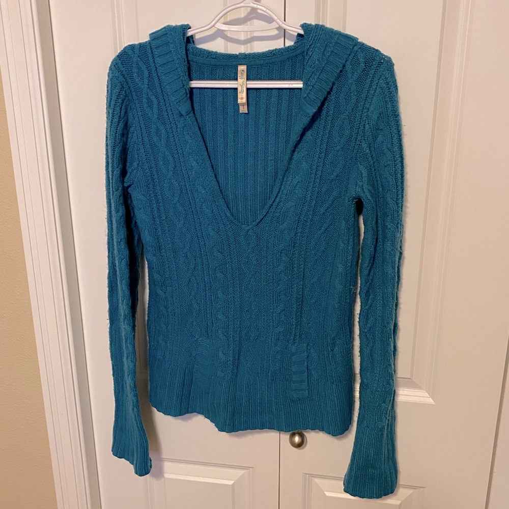 Teal blue hooded cable knit sweater with front pouch pocket